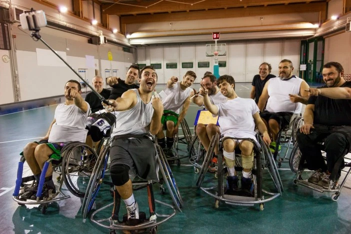 Group of disabled athletes taking a photo together